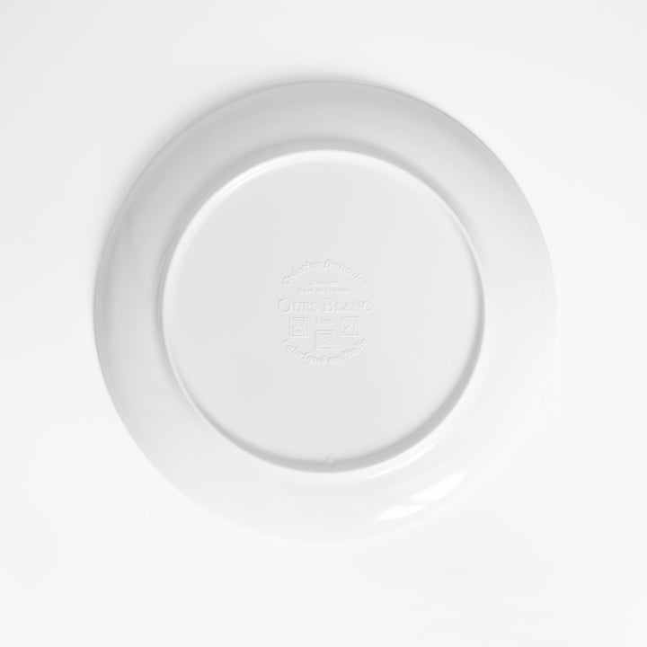 Dos d'une assiette en mélamine Ours Blanc Paris : illustration signée et surface vitrifiée