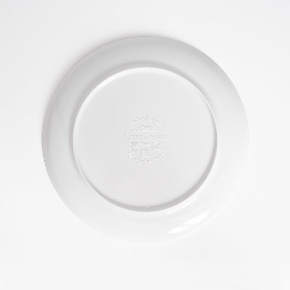 Dos d'une assiette en mélamine Ours Blanc Paris : illustration signée et surface vitrifiée