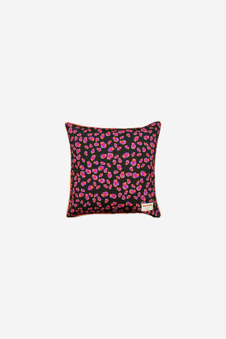 Black cushion with iconic orange and purple leopard pattern - Georges