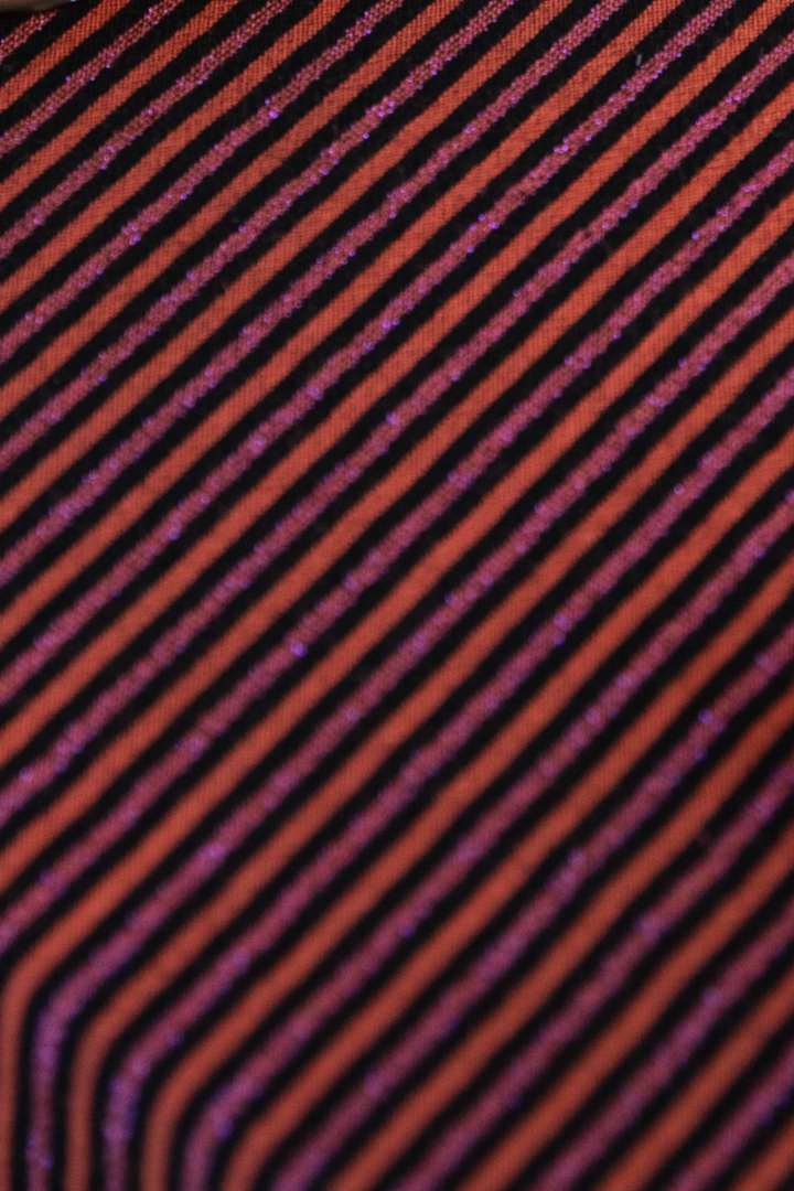Rust and pink iridescent lines cushion - ARMAND