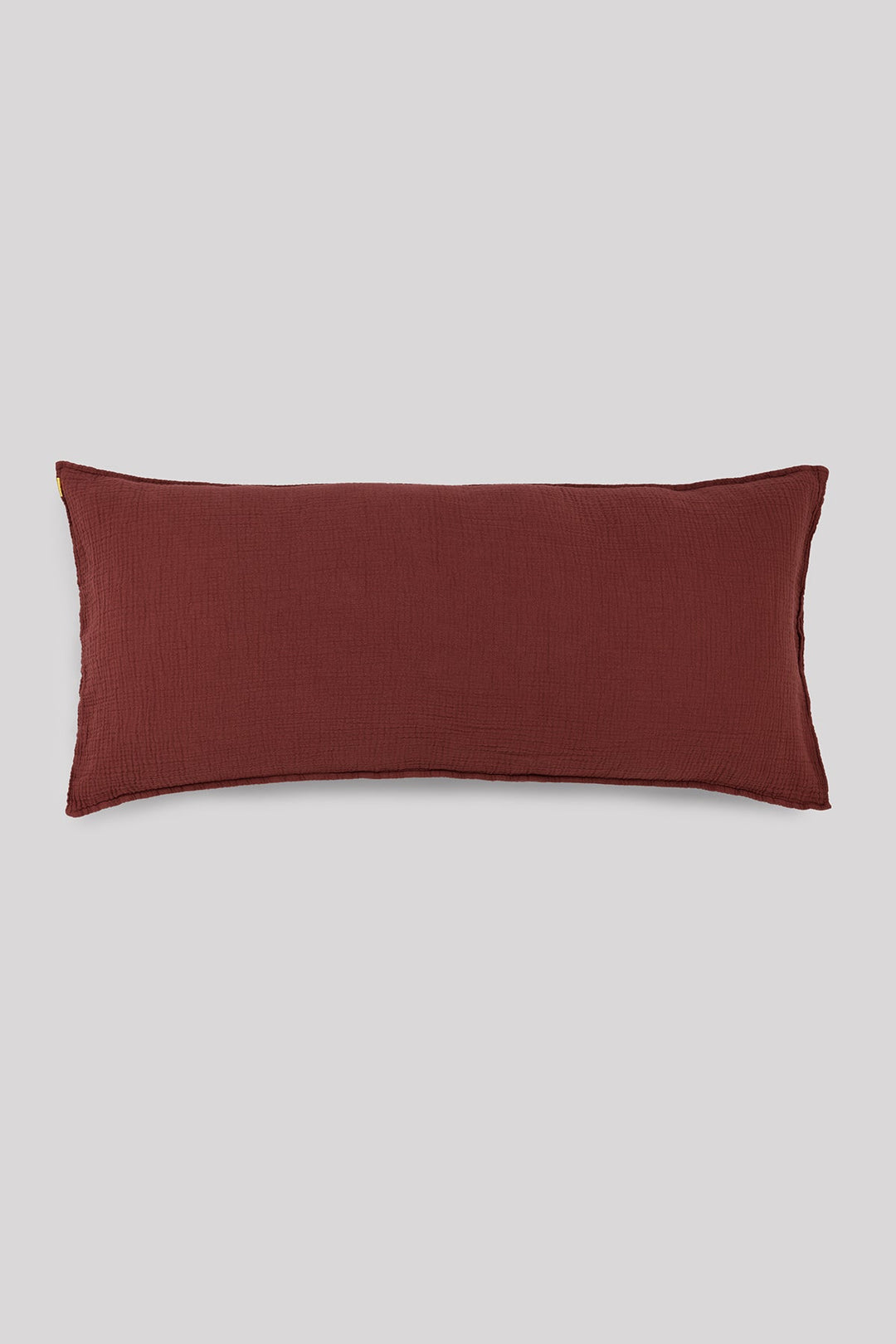 Grand coussin déhoussable en double gaze de coton rouille 45x90cm Coussins Les Pensionnaires