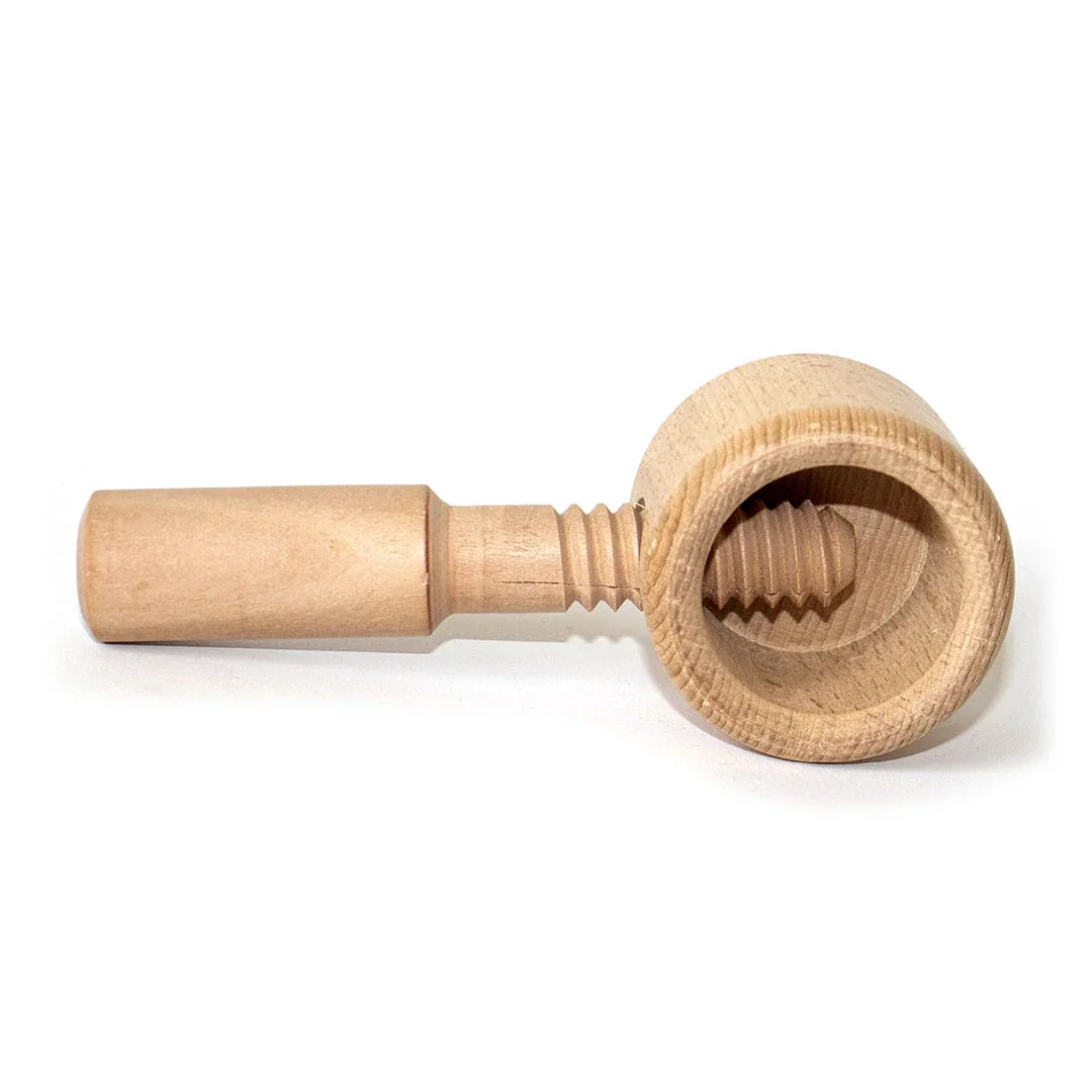 Close-up of Detailed Craftsmanship: Walnut Grinder Showing Intricate Wood Grain and Precision Engineering